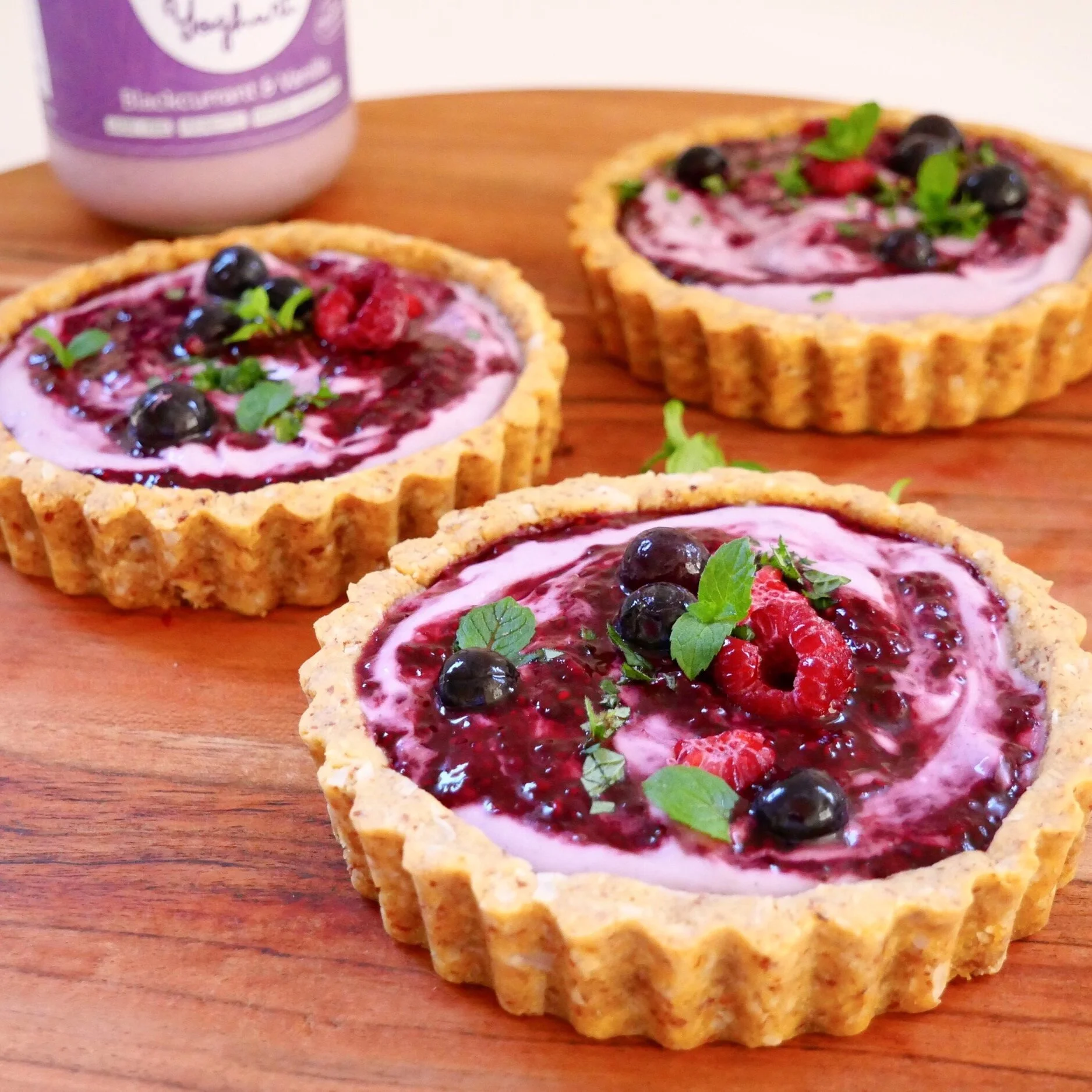 Coconut yogurt &amp; berry jam tarts