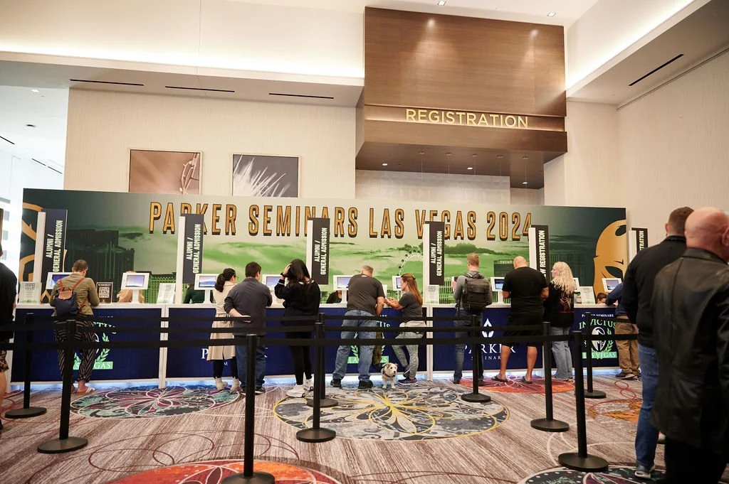 Registration backdrop, counters, and flags for our Las Vegas seminar