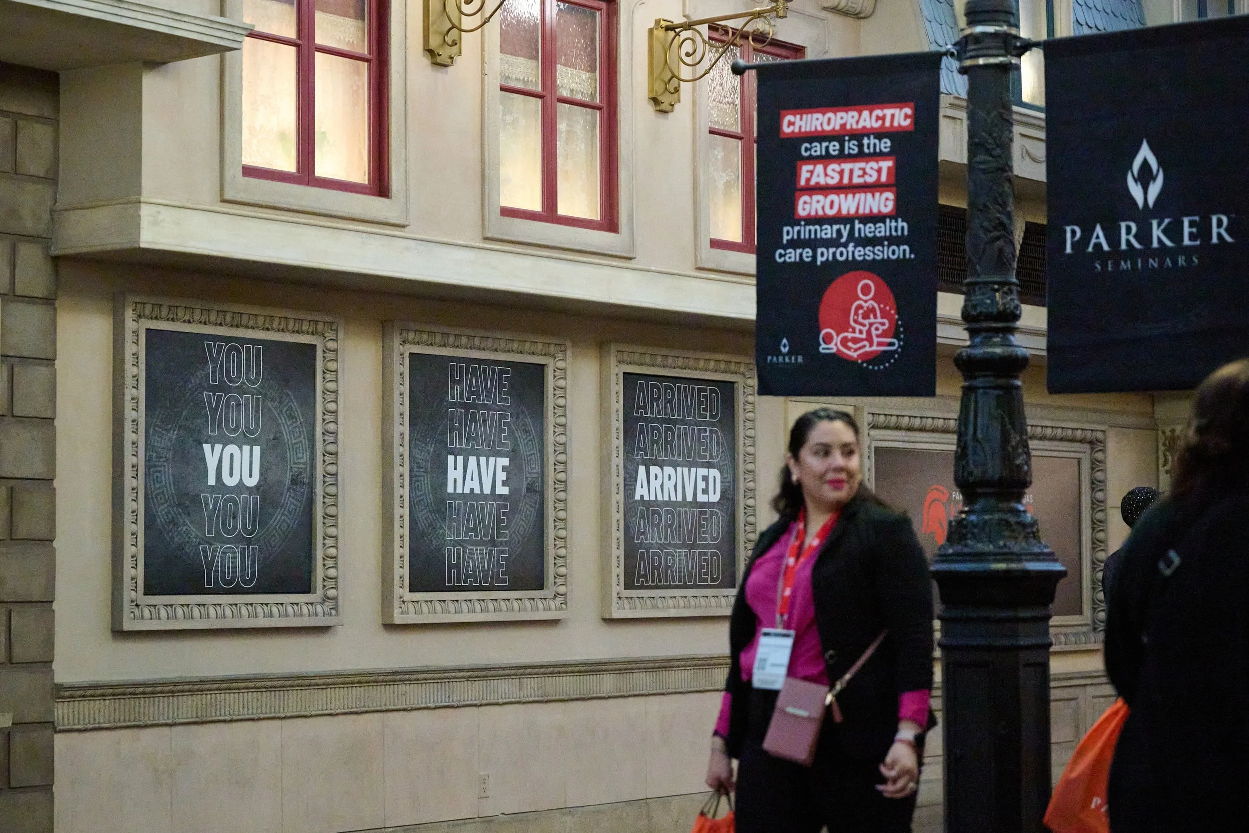 Sticker decals and informational and branded light-pole banner flags for convention space