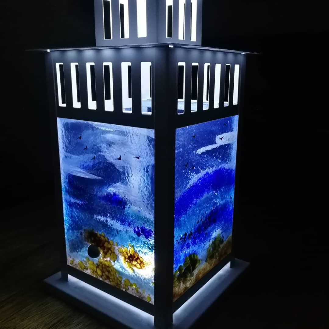 All At Sea lantern, so serene at night! #outdoorlantern #fusedglasslantern #seascapelantern