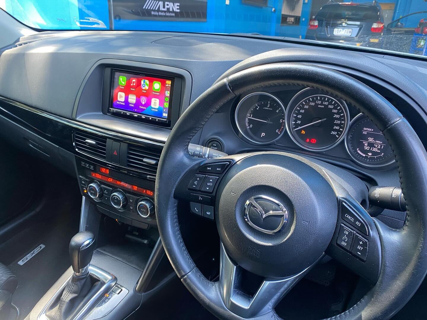 A seamless Kenwood head unit upgrade into this Mazda CX5 now allows the owner to use all her favourite apps on the head unit safely while driving her car! This system also retains the factory steering wheel controls and reverse camera for the custome