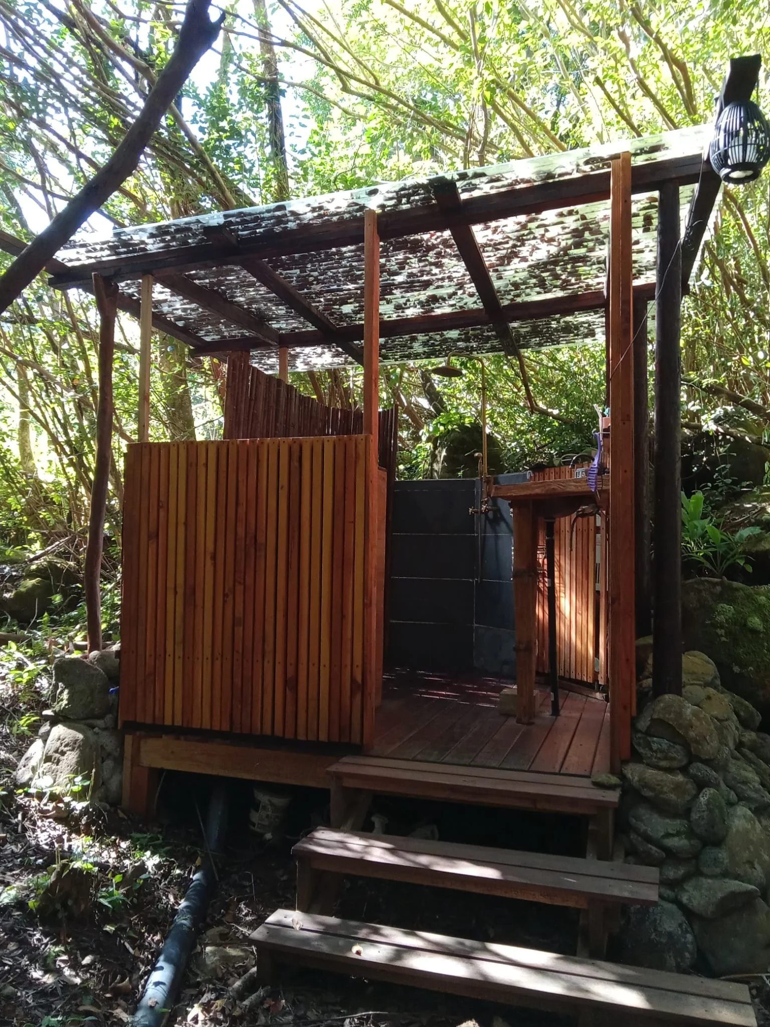 Outdoor Bathroom Near River Cabin