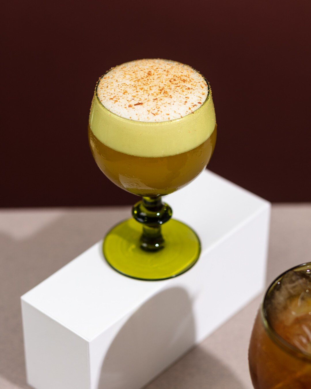Harvest Sour
-
1 egg white
.75 oz Lemon
.75 oz Simple
1 oz Lairds Apple Brandy
1 oz Michters Rye Whiskey

Combine all ingredients in a cocktail shaker and dry shake.  Add half a normandy cube and 1 kold draft cube and shake hard. Strain into a tradit