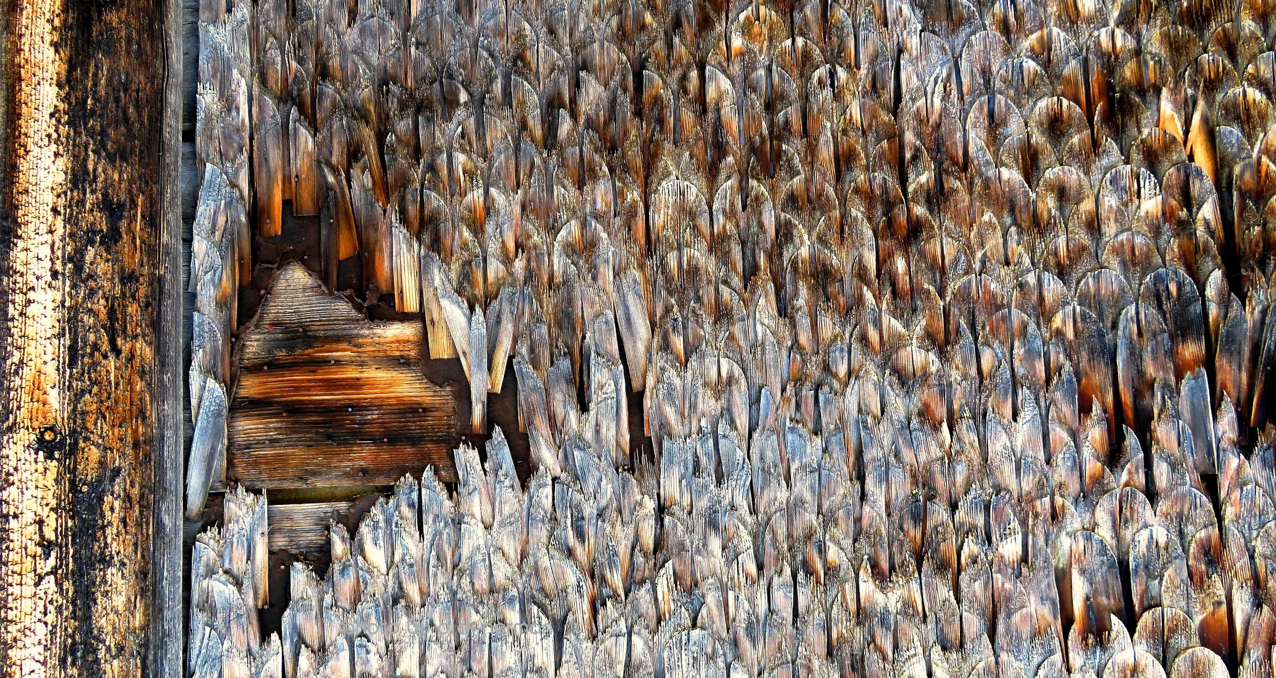 Close-up of the side of a barn in Switzerland