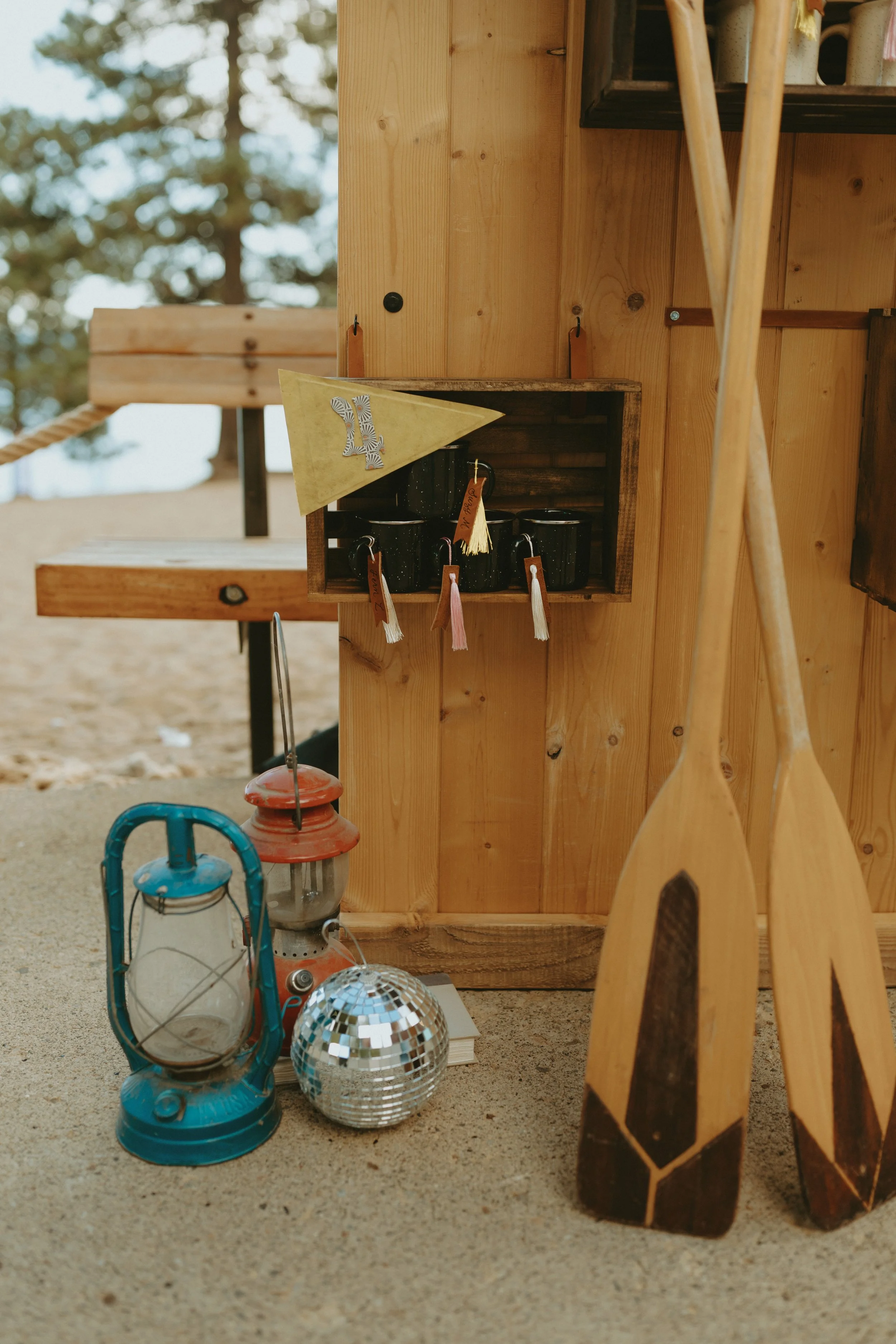 Vintage Oars and Lanterns accessorizing custom wedding seating chart
