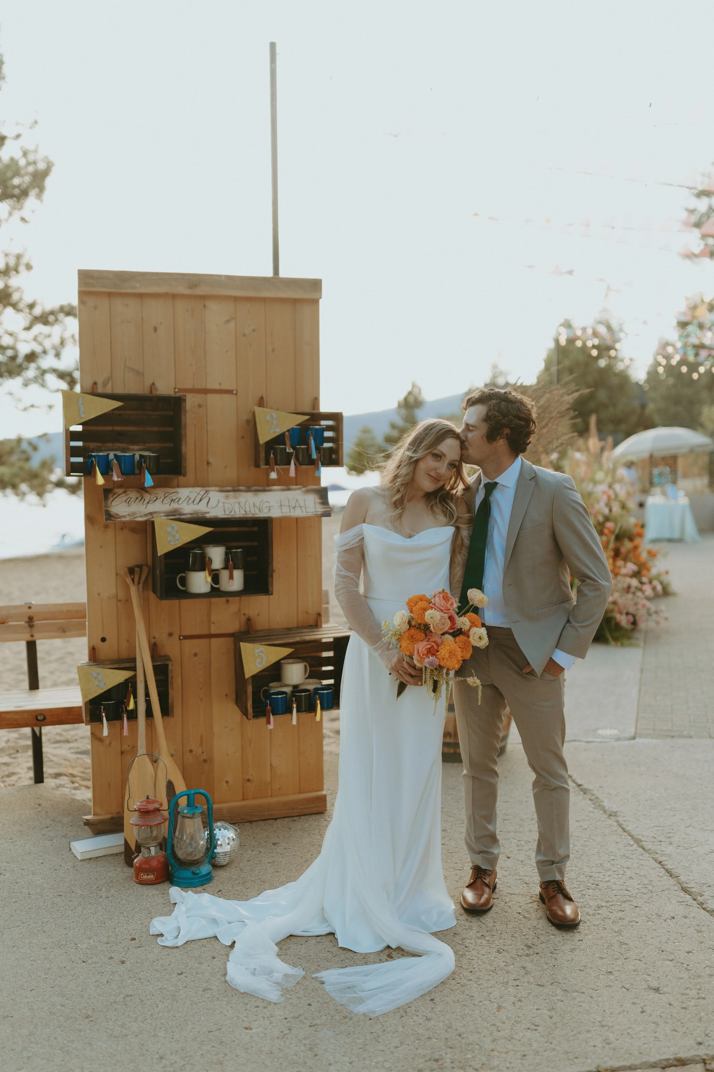 Wedding Couple in front of Custom Wedding Seating Chart