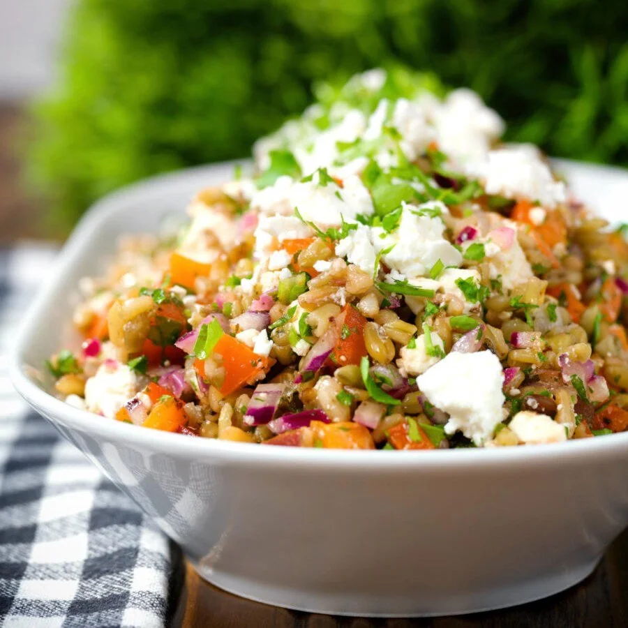🥗✨ Looking for something a little different? This Warm Freekeh Salad with Feta is packed with flavour and goodness! 🌿🧀

Featuring nutty freekeh, sweet peppers, tomato, fresh parsley, creamy feta, and a delicious pomegranate molasses dressing, this
