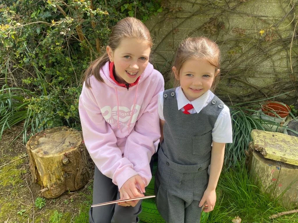 Junior Infants Buddy Reading with 6th Class