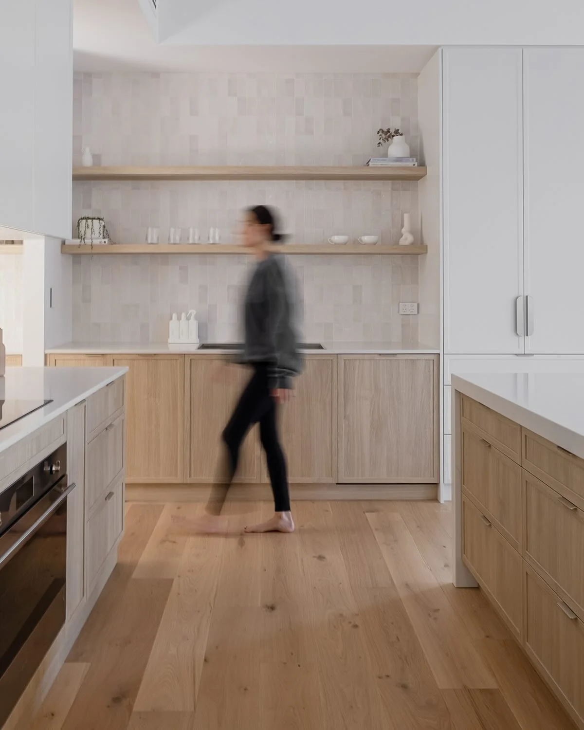 A light-filled kitchen designed for slow mornings and long afternoons, this North Kellyville home backs onto untouched bushland, a constant backdrop of greenery that flows seamlessly into the interiors.

The open layout allows movement between the di