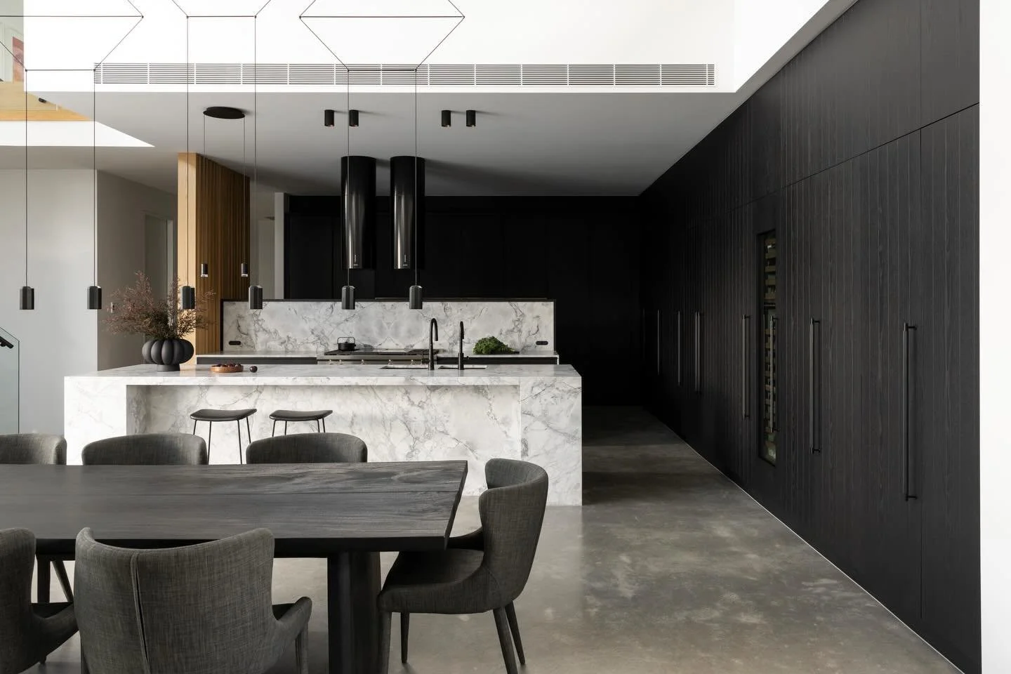 A dark kitchen can look beautiful, but it has to be handled carefully.

In an open-plan home, the kitchen is always visible. So for the Lindeman Project, it needed to feel refined and strong without becoming heavy.

The brief was to create a kitchen 