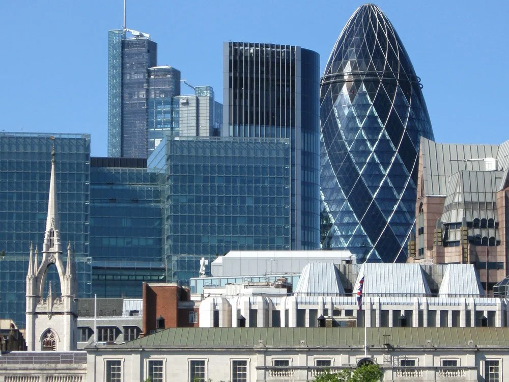 A photography of the London skyline, including the Gherkin building