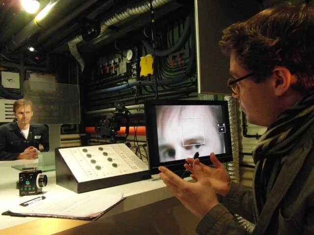 Director Richard Mundy talking through a scene in the hub with lead actor Andrew Kinsler