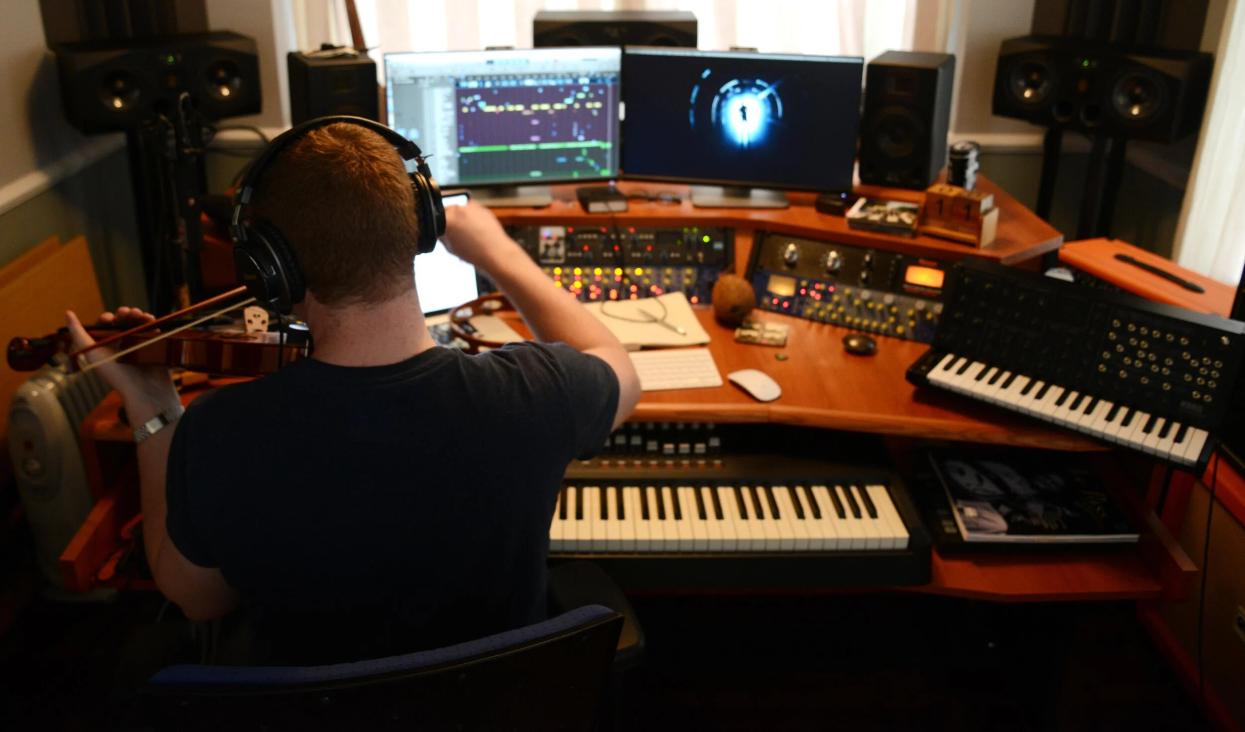 The film's composer (and co-producer) Harry Kirby at work