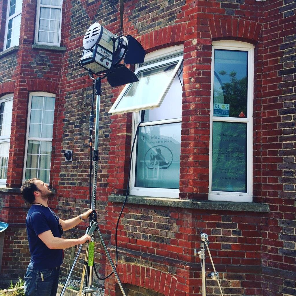 On set for 325productionsUK using an HMI to act as the sun for an interior scene.