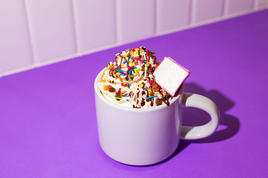 A bit of a nip in the air before the weekend's heat wave! 😎

Dip in for some Hot Chocolate (choose classic, cherry chocolate or dark) topped with whipped cream, sprinkles, drizzle and a homemade marshmallow. 🎉 Open 12pm 'til 8pm!