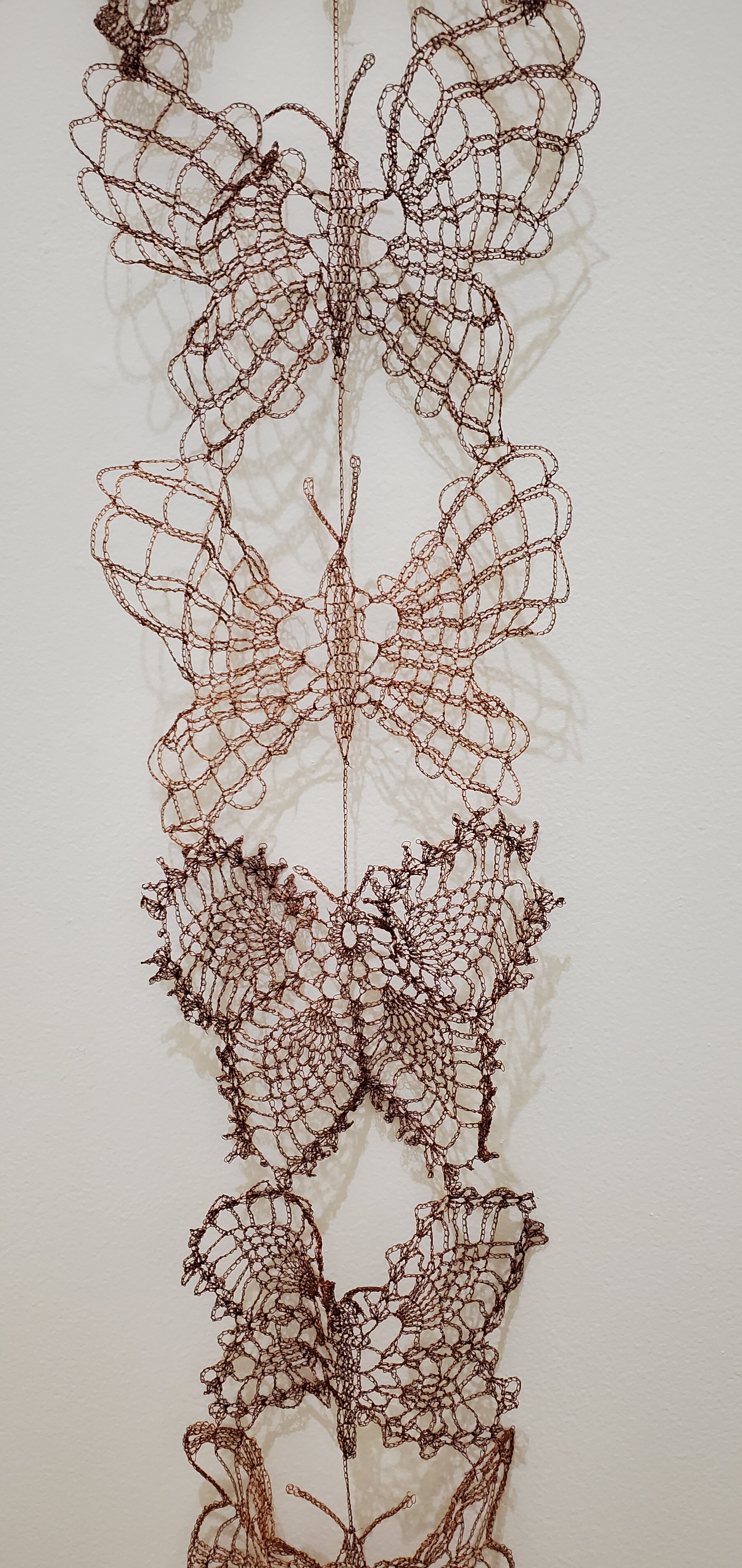 ektor garcia, Mariposas (detail), 2021. Crochet copper wire 9’ 1⁄2 x 14 (at top) x 1.5 in.