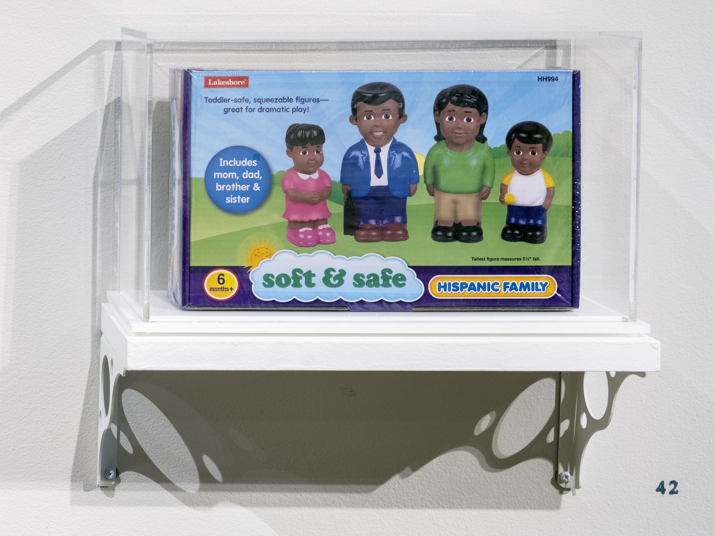  Installation view.  Soft and Safe Hispanic Family . Found object: educational toy | 2022.  The Museum of the Old Colony , Duke Hall Gallery of Fine Art, 2022. 