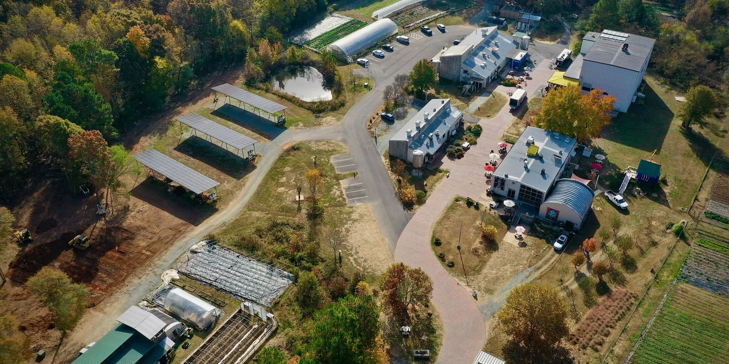 aerial image of the plant, a sprawing industrial complex in pittsboro nc that is now home to music venue, organic farm, artists studios and restaurants