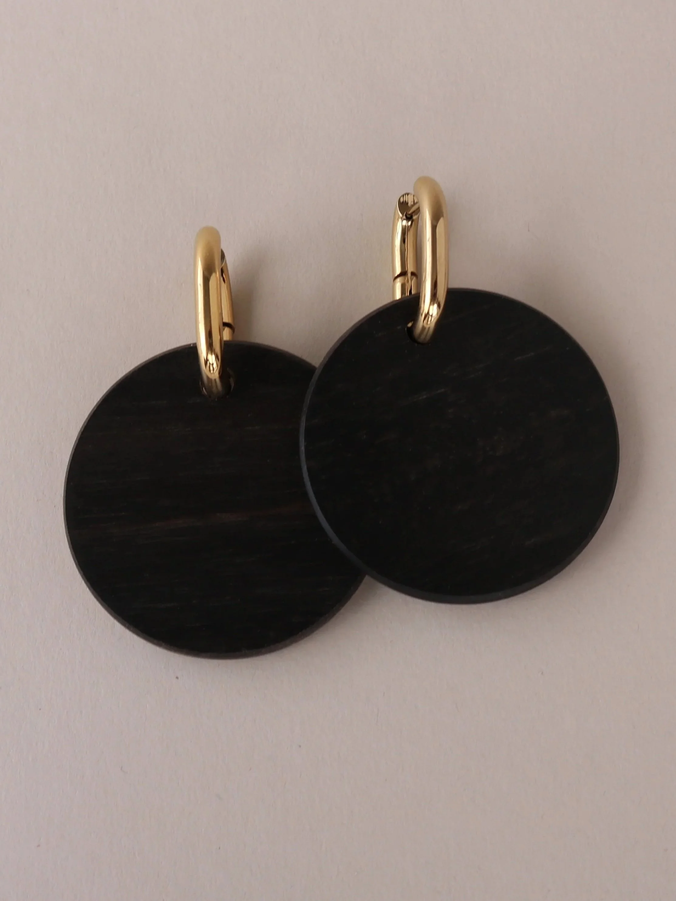 Large Solid Circles in Ebony with Metal Hoops