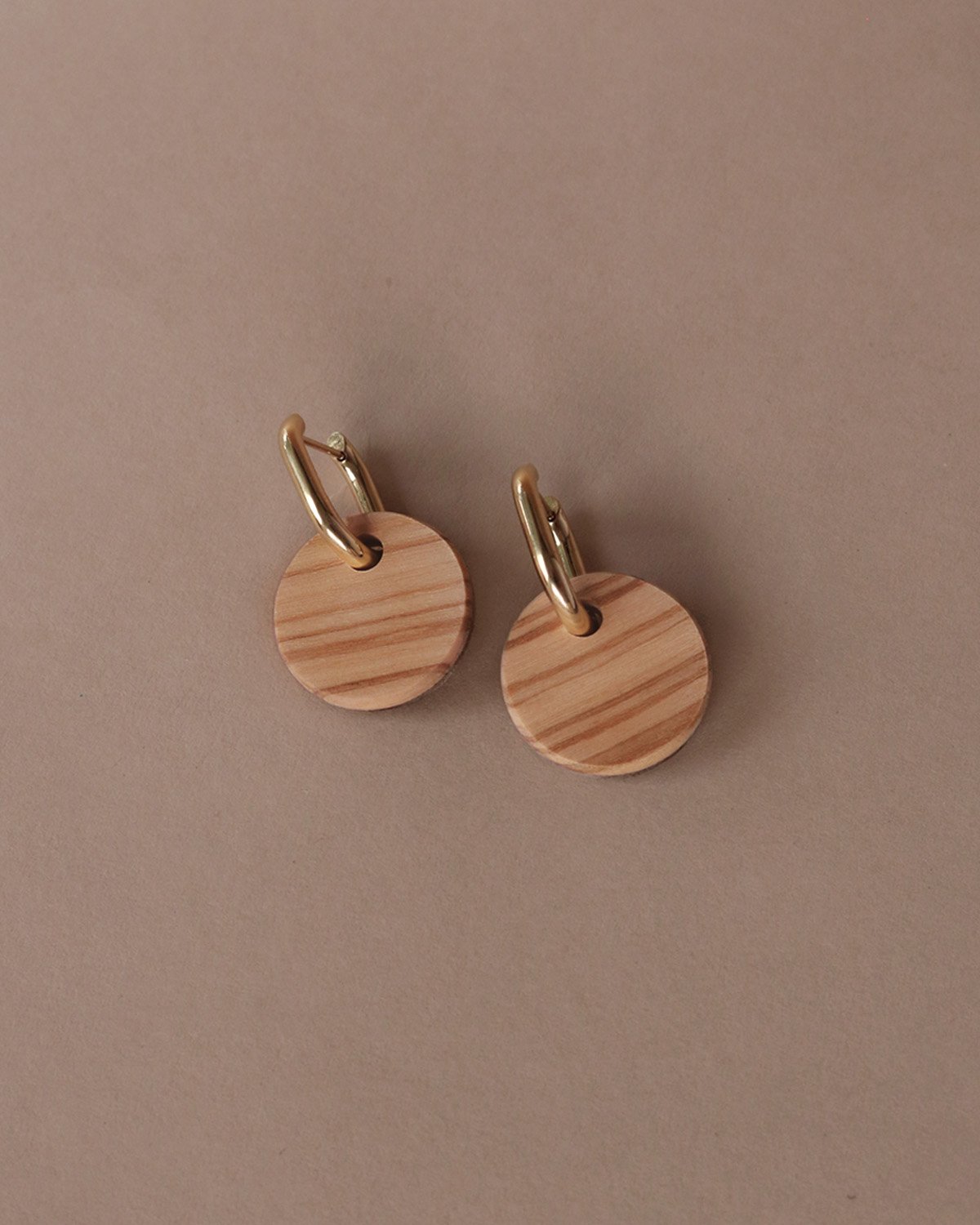 Small Solid Circles in Olivewood with Metal Hoops