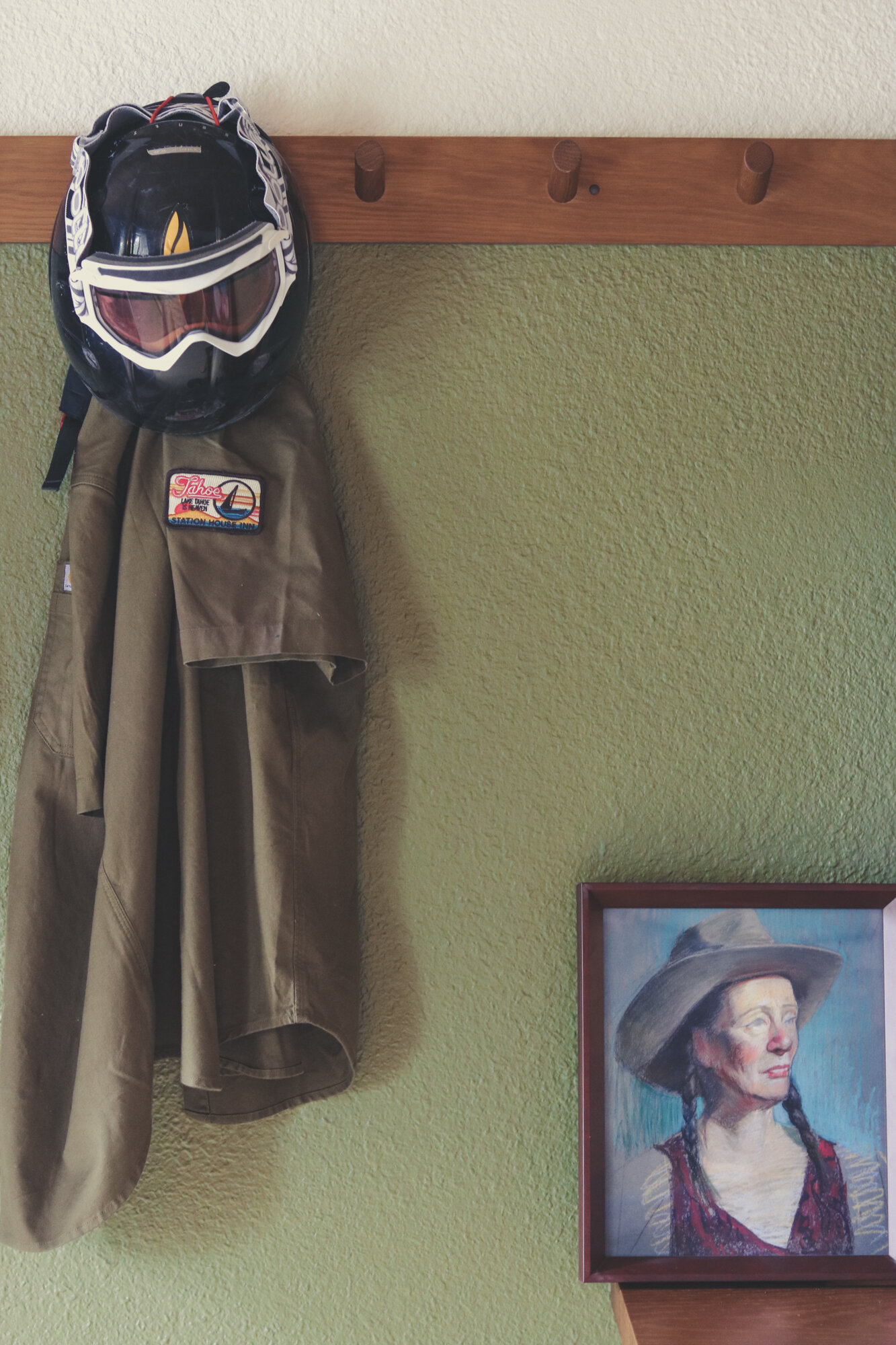 helmet hanging on wall 