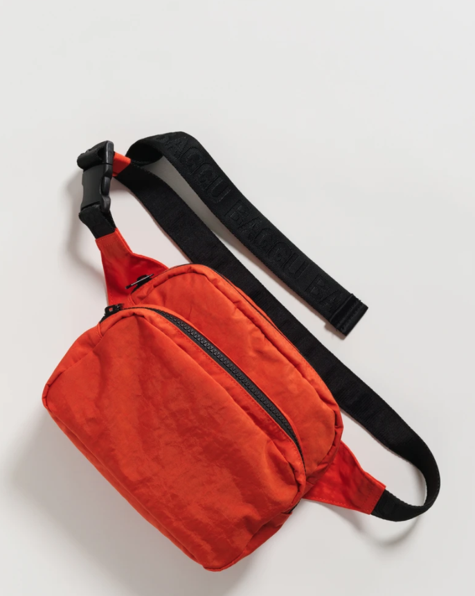 red gucci fanny pack with writing