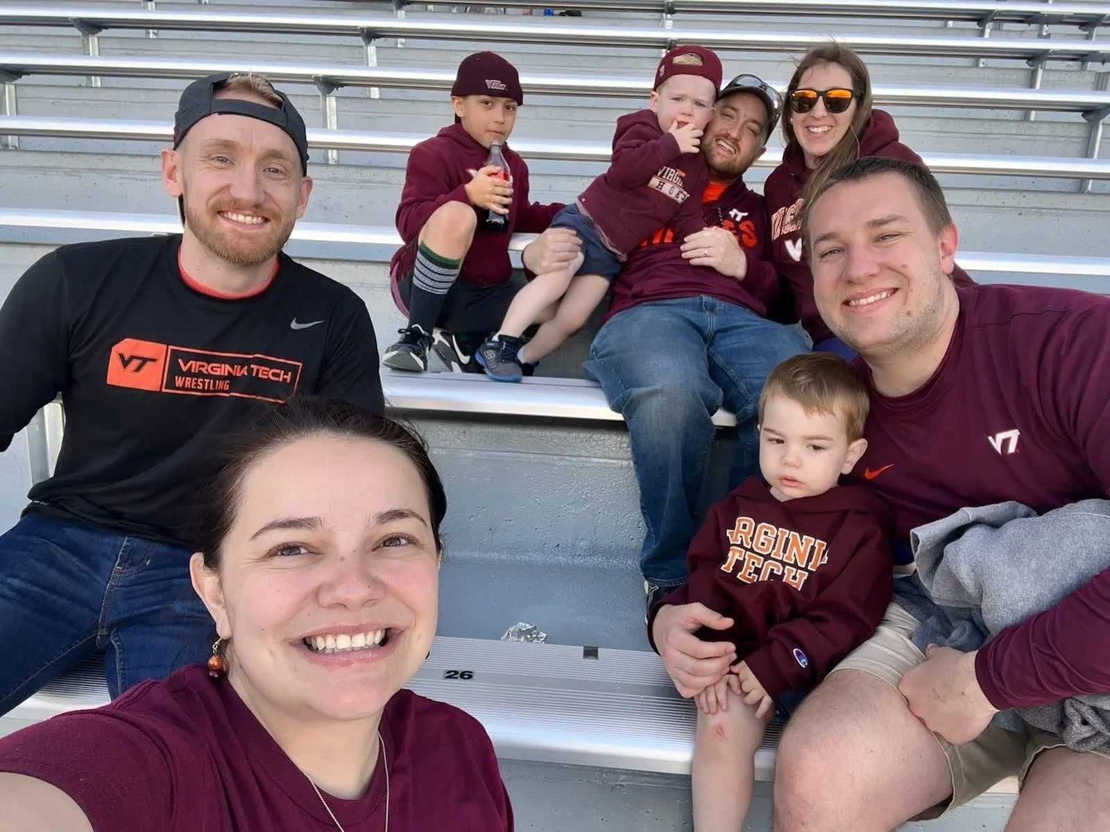 Chrisman family with children at a Virginia Tech football game