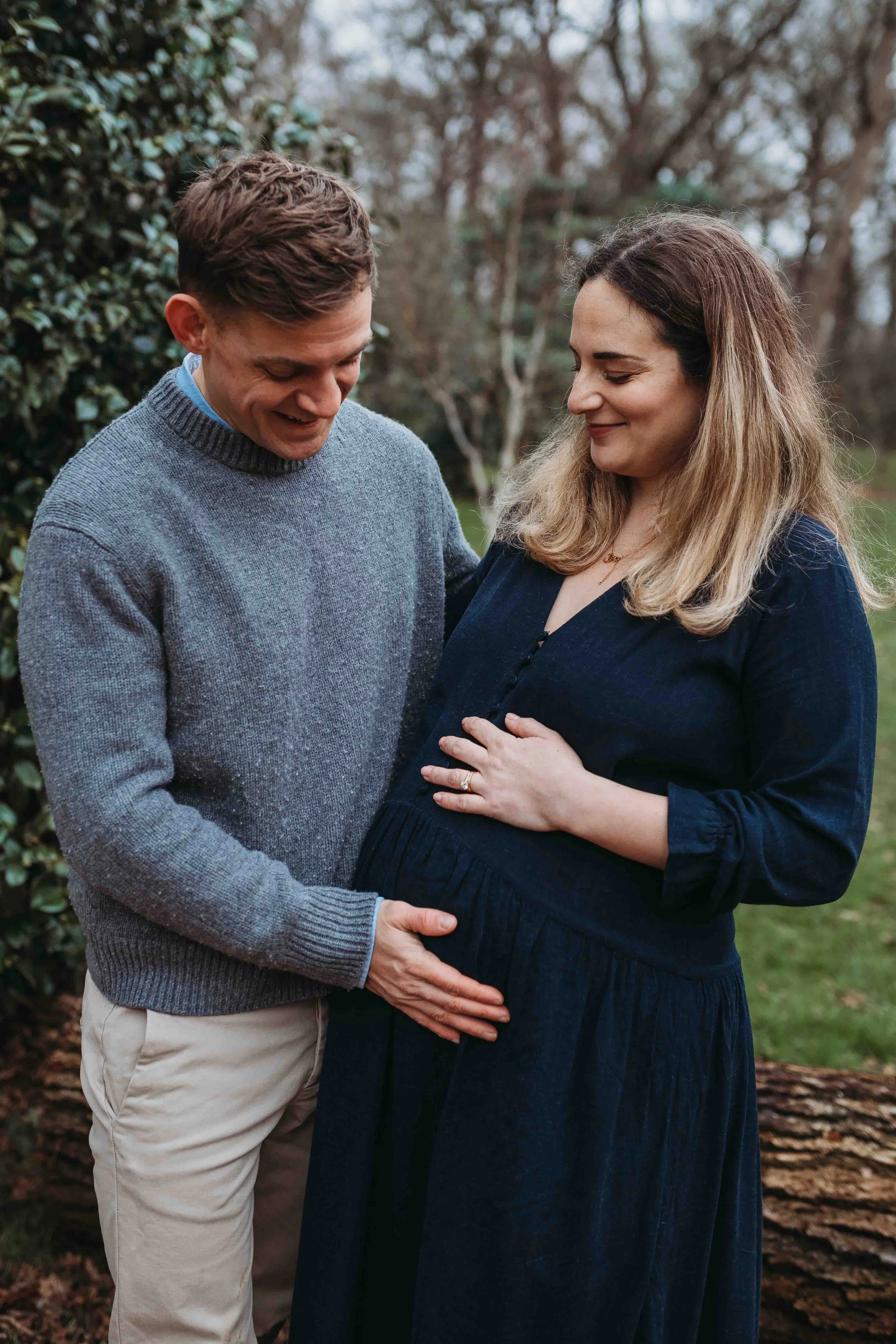 expecting couple during a winter maternity photography session in Richmond Park London