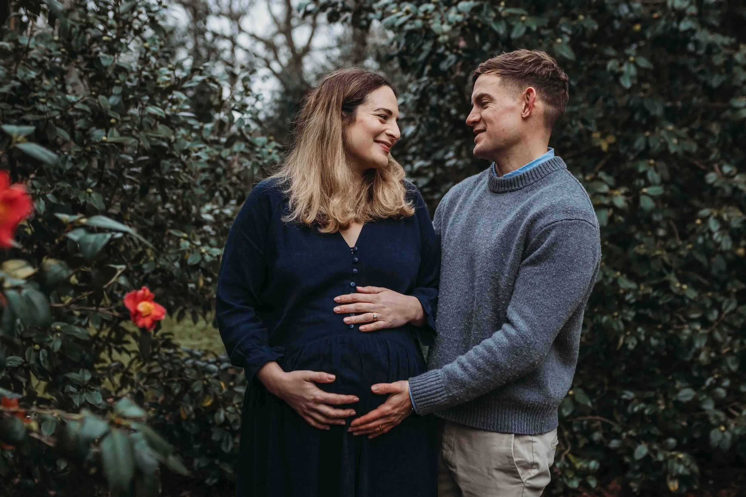 expecting couple during a winter maternity photography session in Richmond Park London
