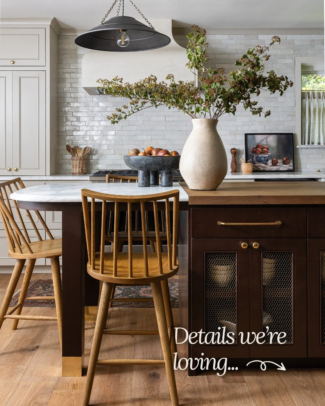Details we keep coming back to in this kitchen. 🤎

The dark burgundy island against those light cabinets, the brass hardwares, that pendant. It&rsquo;s just that good.

Project: Cottage Down the Hill
Design by @ledgerandladder
Styling by @elizabethu