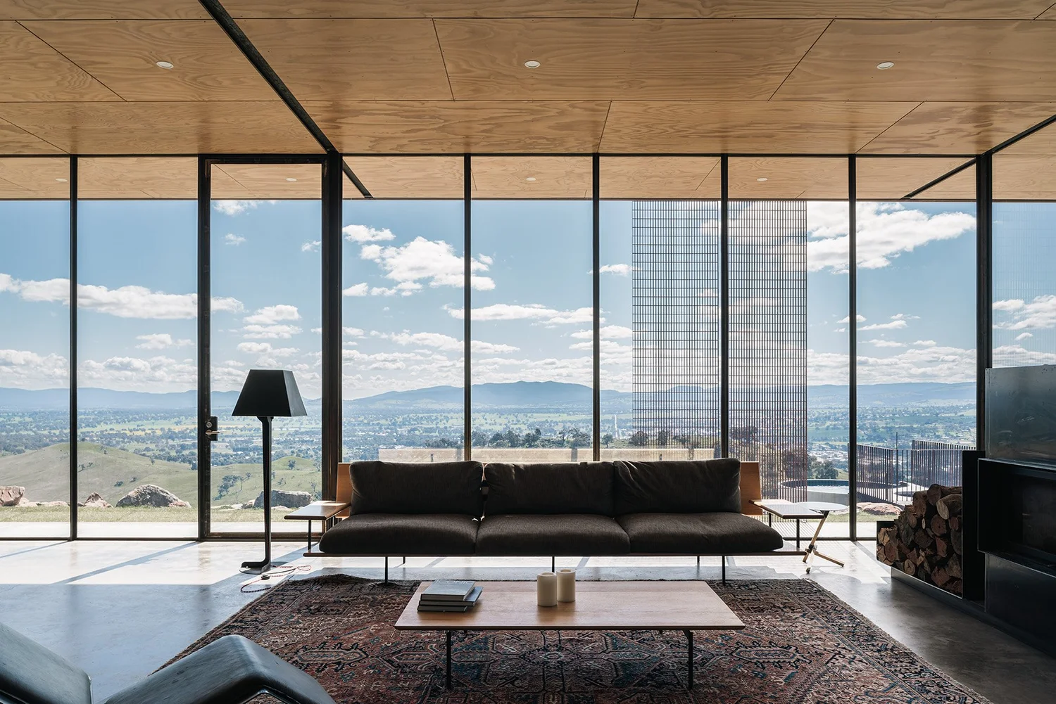 View of How This Minimalist Off-Grid Home Uses Steel, Concrete and Glass ...
