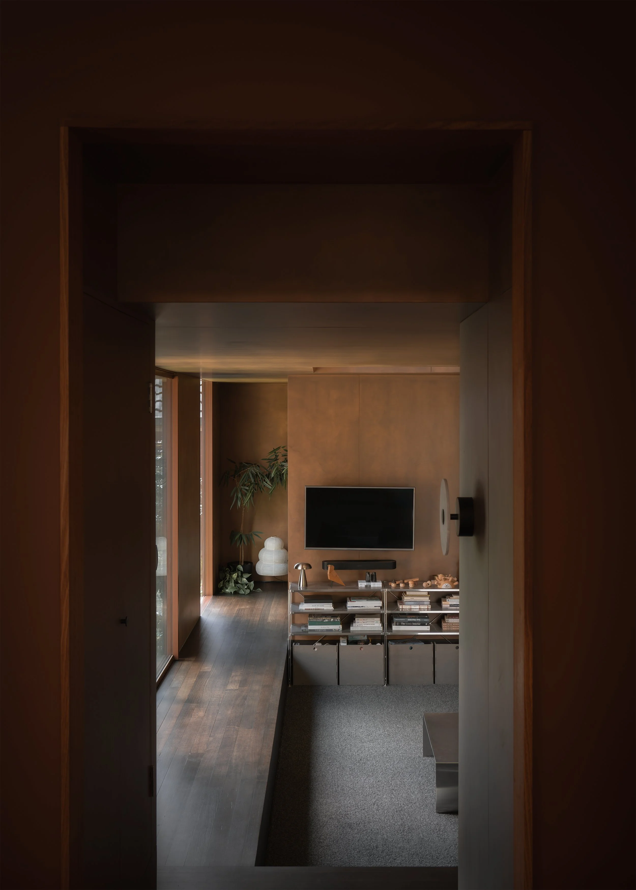 Why a Dark Interior Draws Your Eye to the Garden