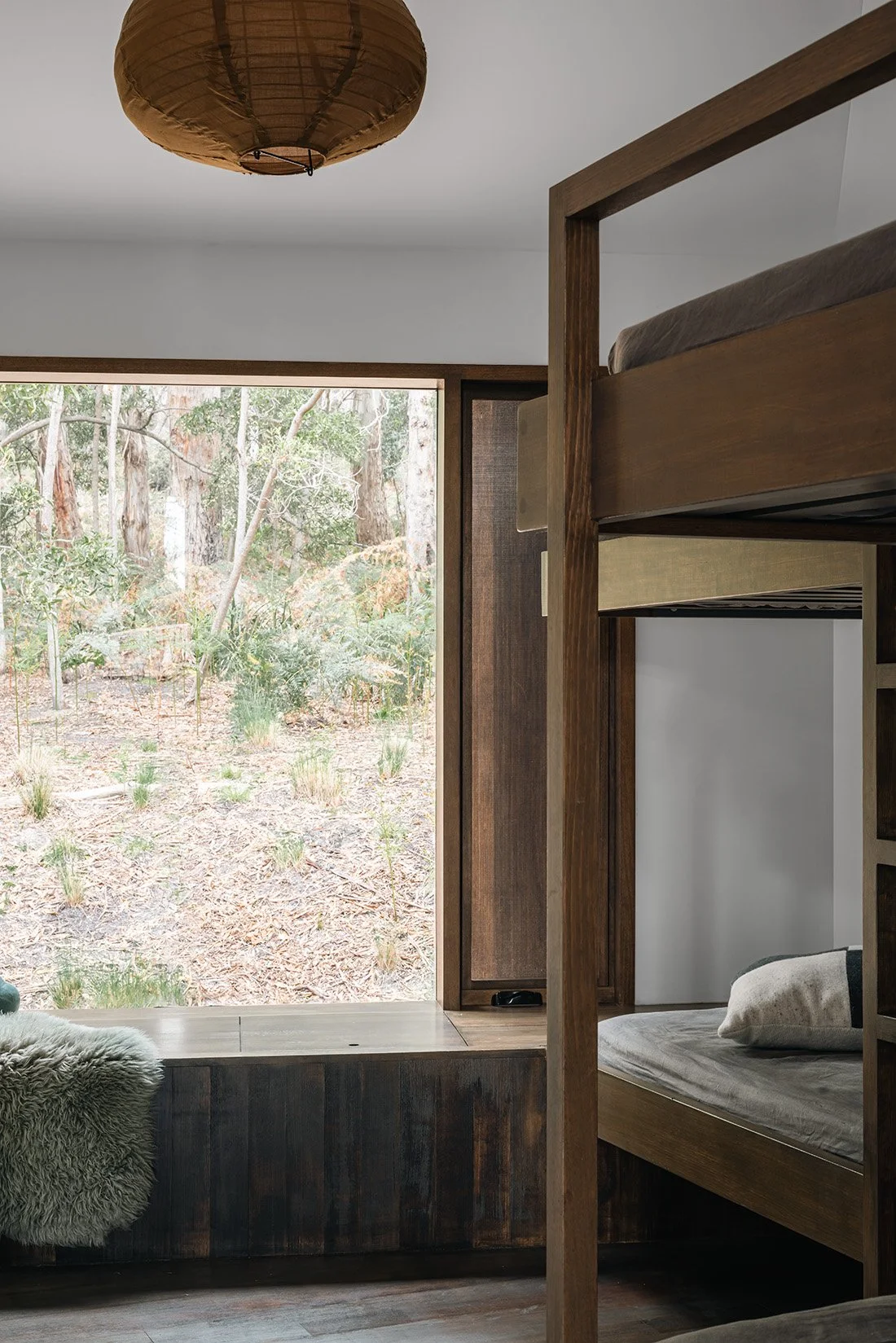 Custom timber bunk bedroom inside Killora Bay, a compact family retreat on Bruny Island, Tasmania.