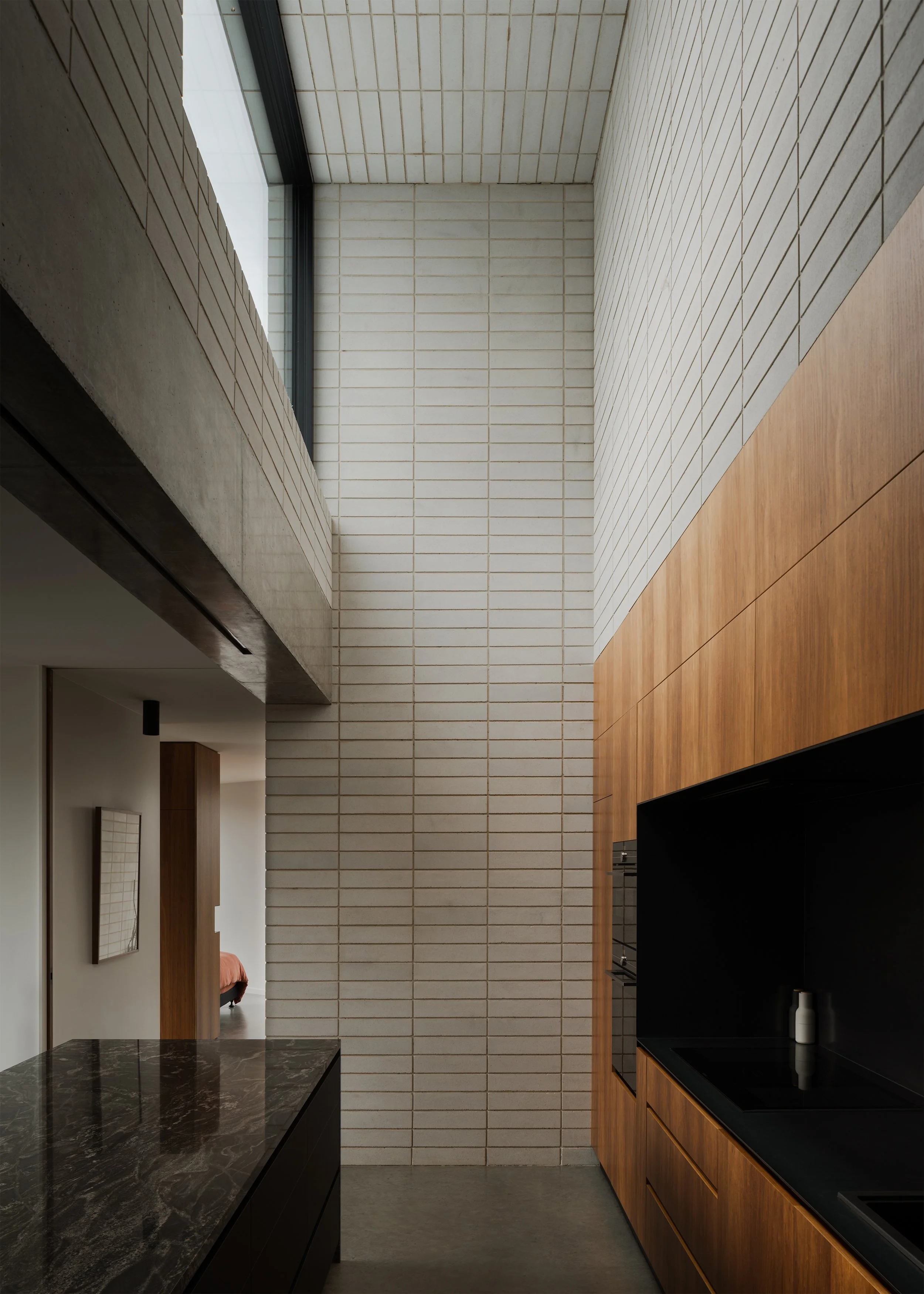 timber kitchen and blockwork interior – Australian house design – Hobart house – Hobart Tasmania Australia –Eyrie House by Matt Williams Architects – Simple Dwelling