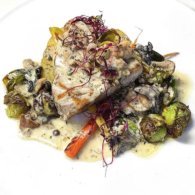 Check out this lovely pesce dish! 🐟 ~ Grilled swordfish, roasted carrots, fried brussels sprouts, mushroom sherry cream ~ 📸 by @zakpiasta