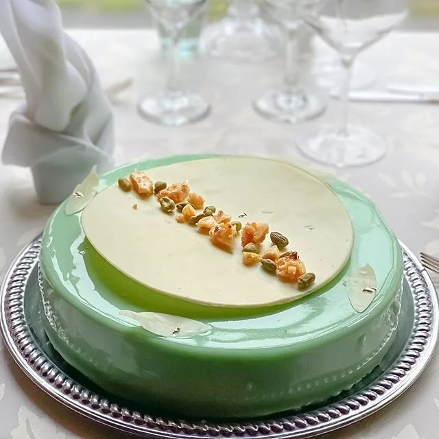 This lovely pistachio cake by Pastry Chef Haley is the newest addition to our dessert menu! 💚 ~ Pistachio mousse, white chocolate center, honey cake, white chocolate glaze ~ 📸 by Chef Eric