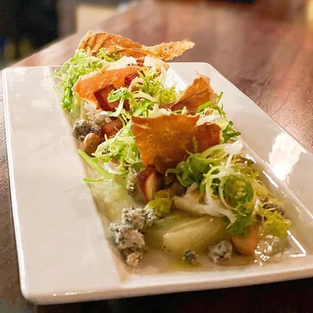 Delicious wedge salad, prepared and 📸 by Chef Eric! ~ Braised fennel, blue cheese, prosciutto crisp, compressed pear, hazelnut, frisee ~