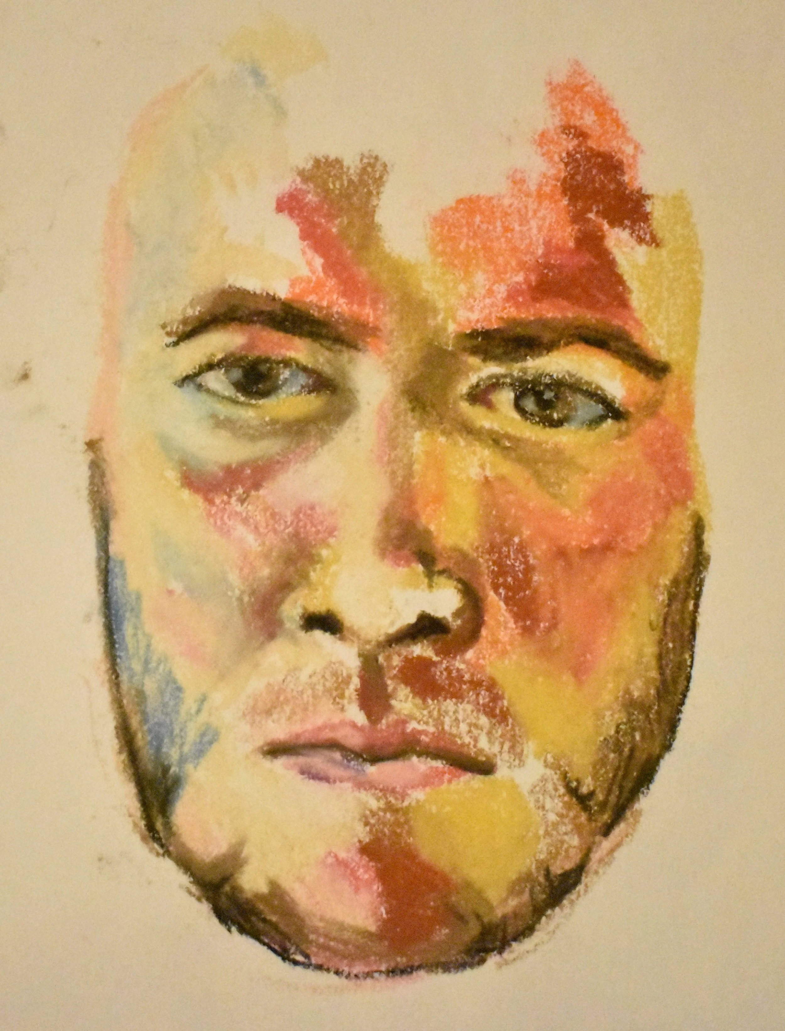 A watercolor or pastel painting of a person's face with a neutral expression, featuring light blue eyes, dark eyebrows, and lips, with abstract patches of color including yellow, red, and brown on the face.