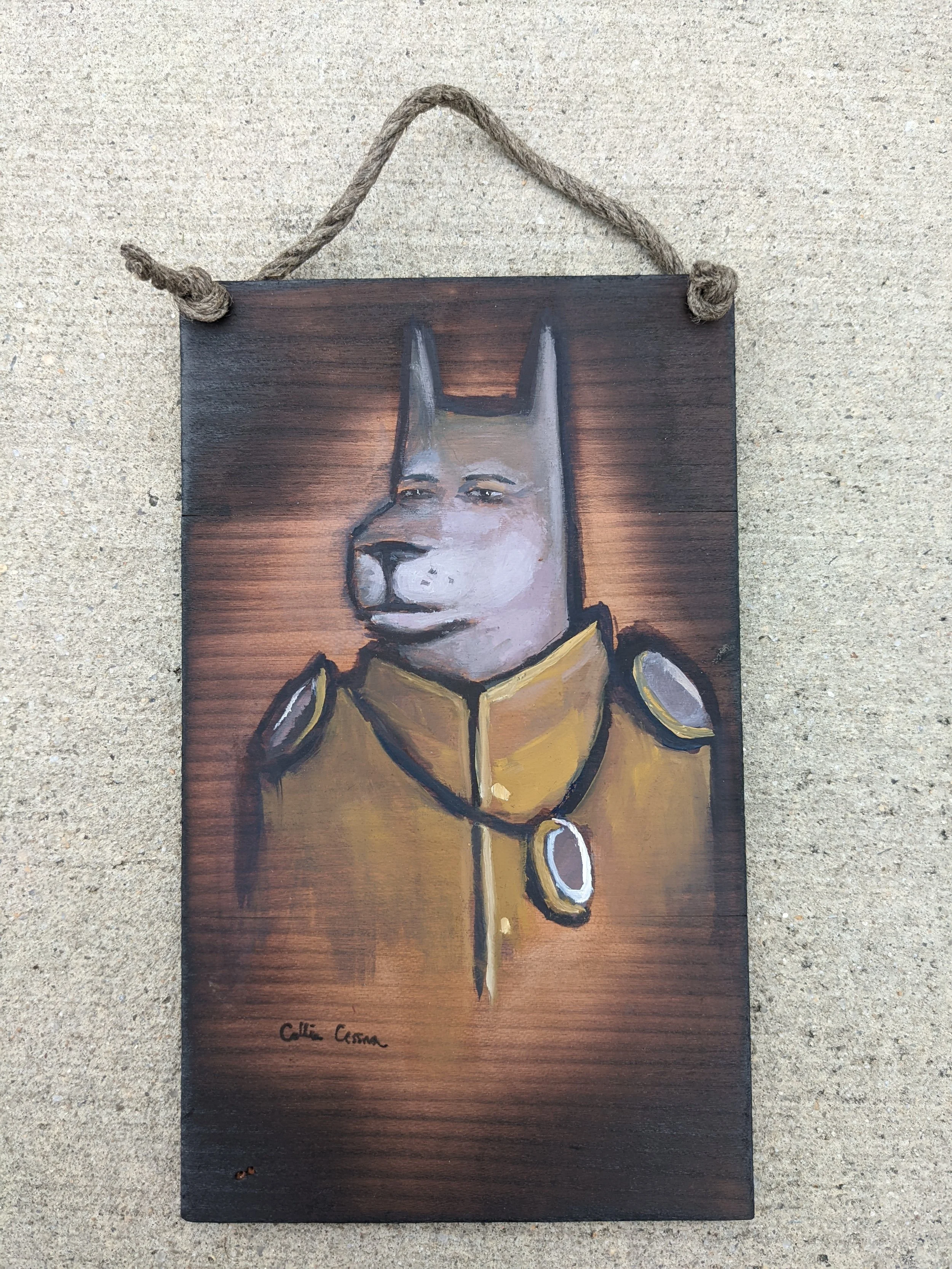 A painted portrait of a husky dog with human eyes, dressed in a yellow military uniform with shoulder epaulets and a decorative pin, signed by the artist Clif Corm.