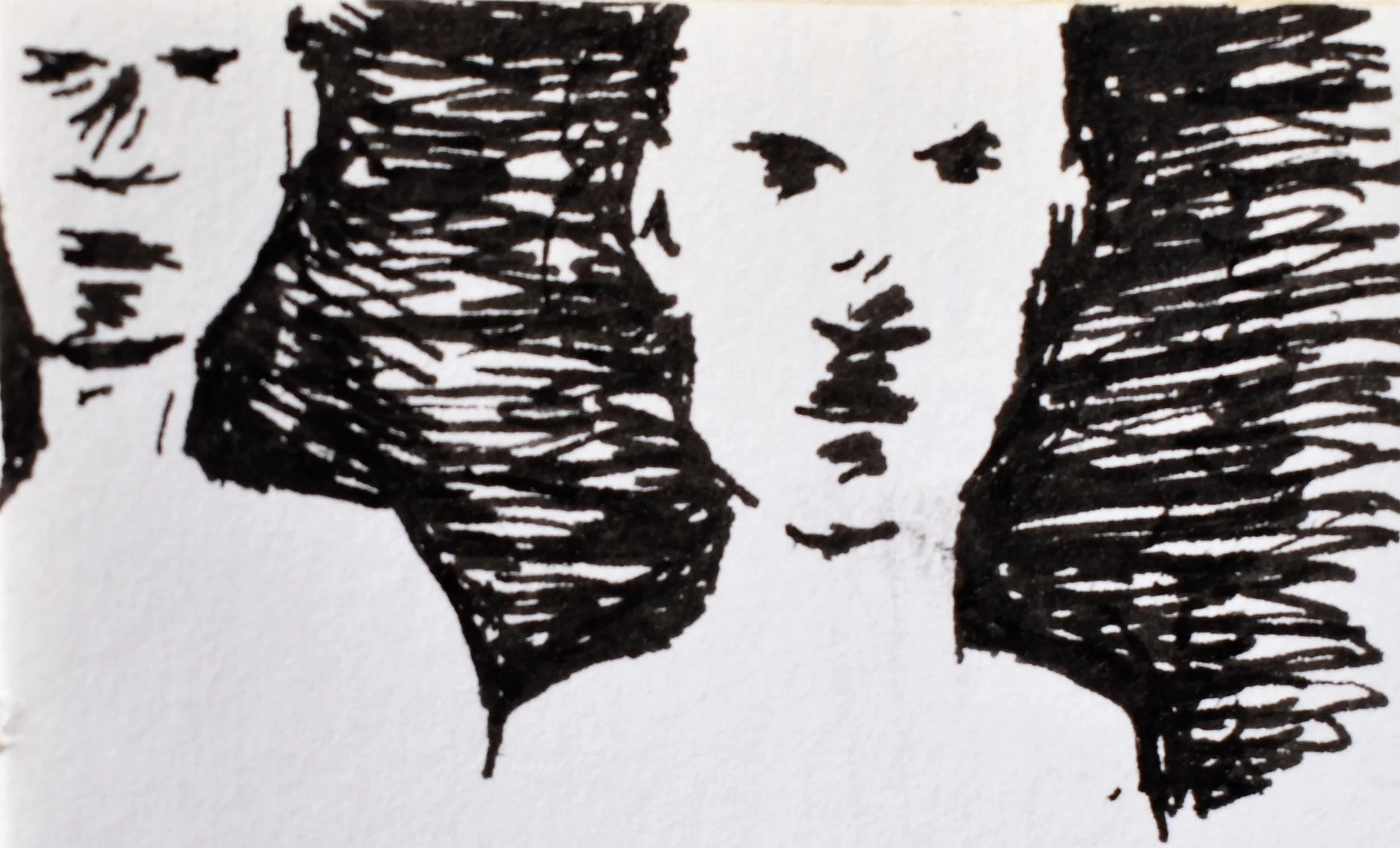 Black ink sketch of a person's side profile with short hair, facing a mirror, with hints of their face and the mirror's reflection visible.