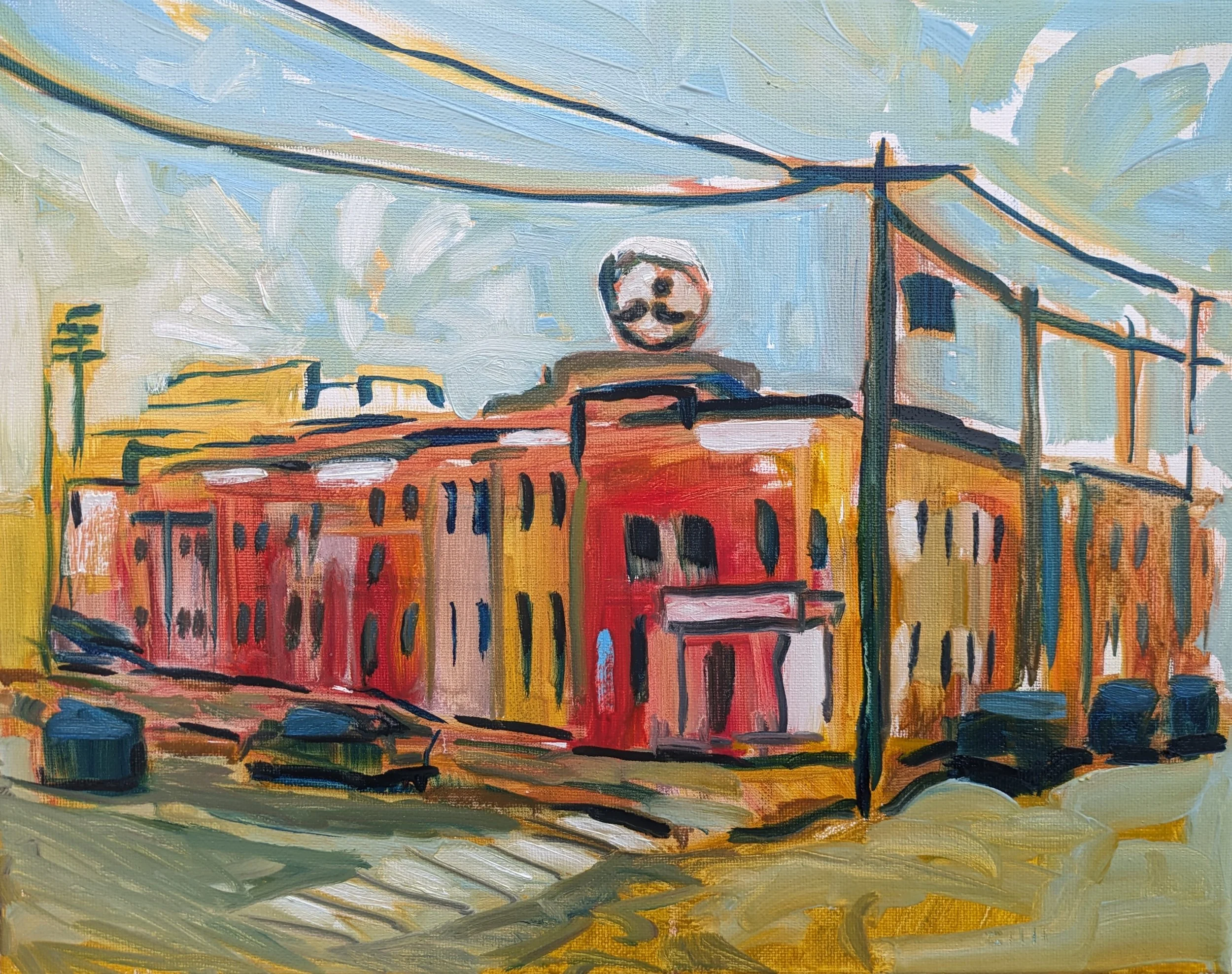 An impressionist-style painting of a cityscape with red and yellow buildings, railway tracks, and overhead power lines against a cloudy sky.