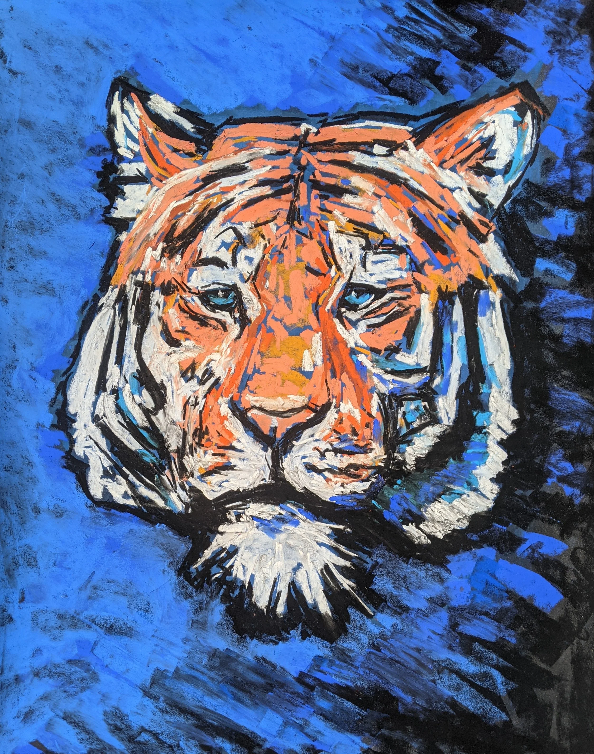 A colorful painting of a tiger's face with a blue background.