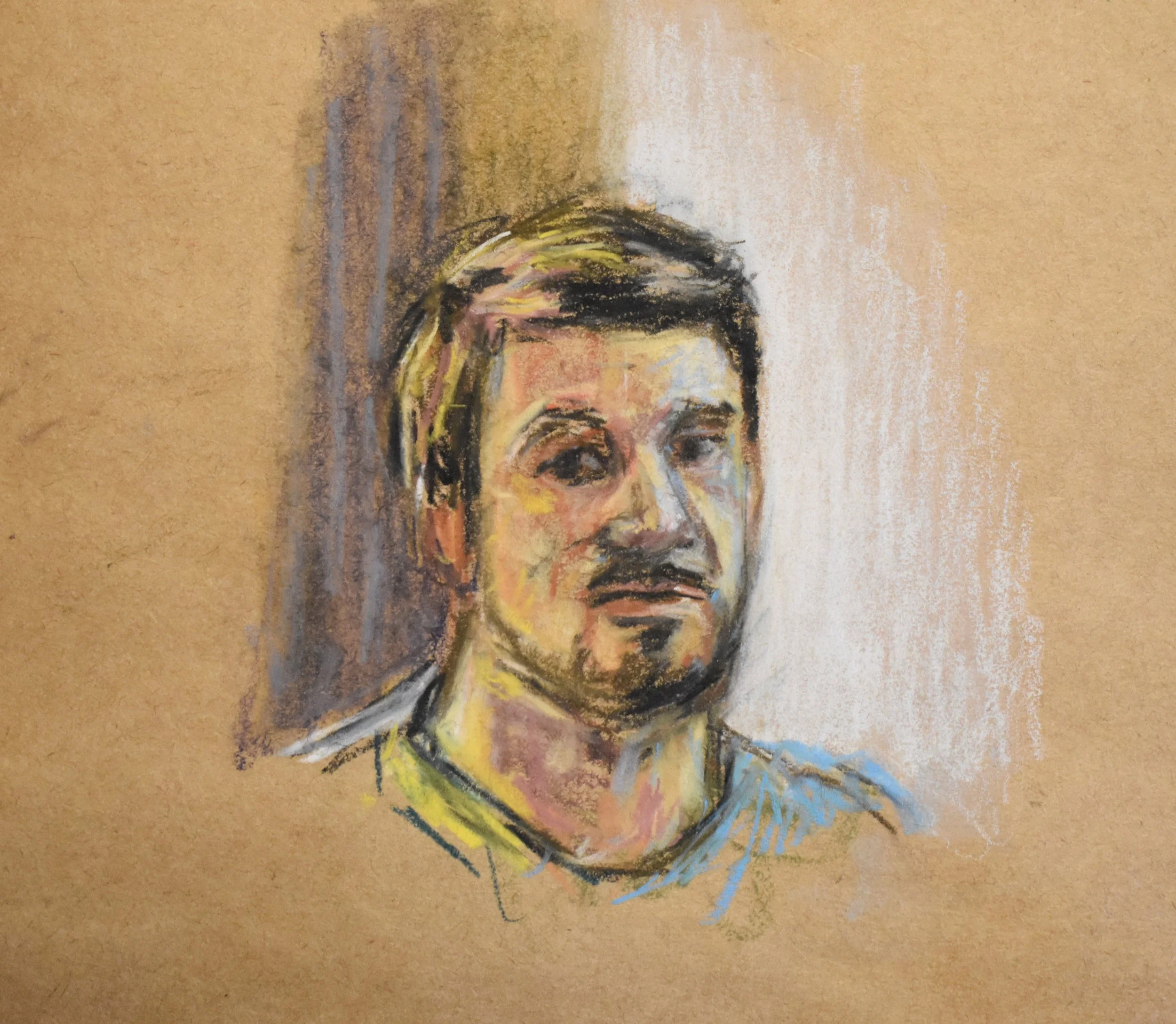 Colorful portrait drawing of a man with dark hair, a mustache, and a goatee, wearing a shirt with a black collar, against a beige background.