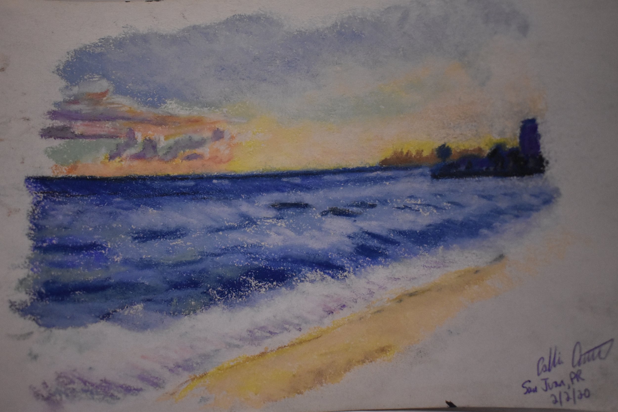 Watercolor painting of a sunset over the ocean with a sandy beach in the foreground and a distant shoreline with buildings and trees on the horizon.