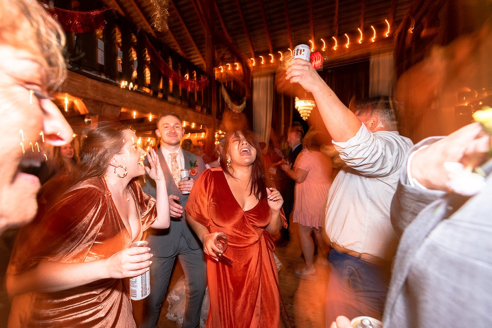 KirstenChris-long-exposure-dancing-wedding-reception-barn.jpg