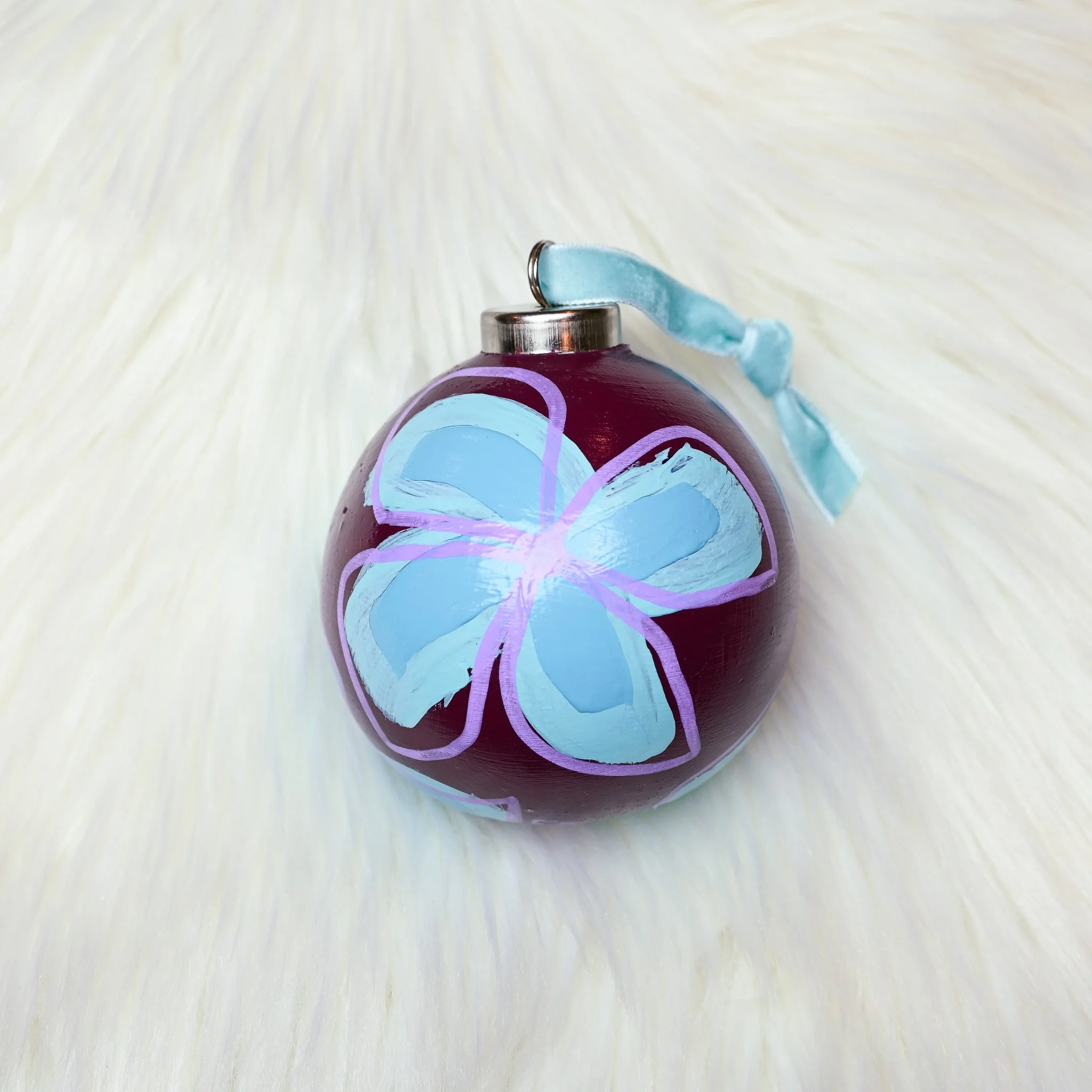 TURQUOISE FLOWERS ON BURGUNDY