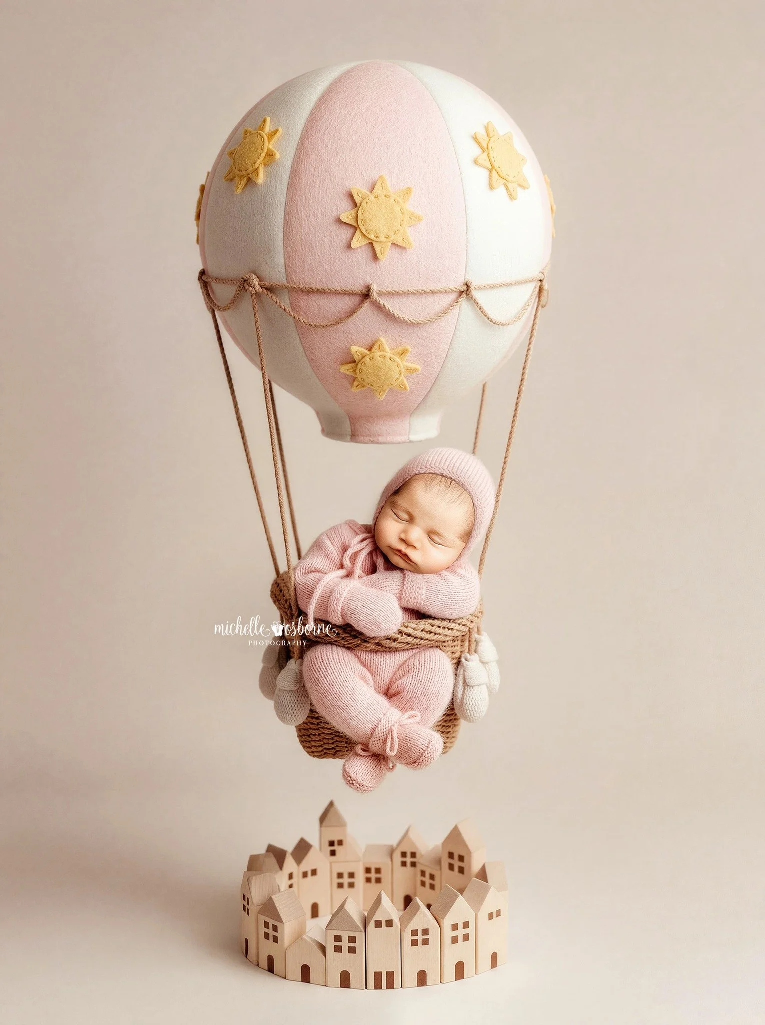 I love customizing a session and matching some images to baby's nursery or incorporating that theme in some way if I'm able to. This precious girl's room has hot air balloons and Mom also mentioned incorporating the sun as a nod to her 'Sunshine' nic