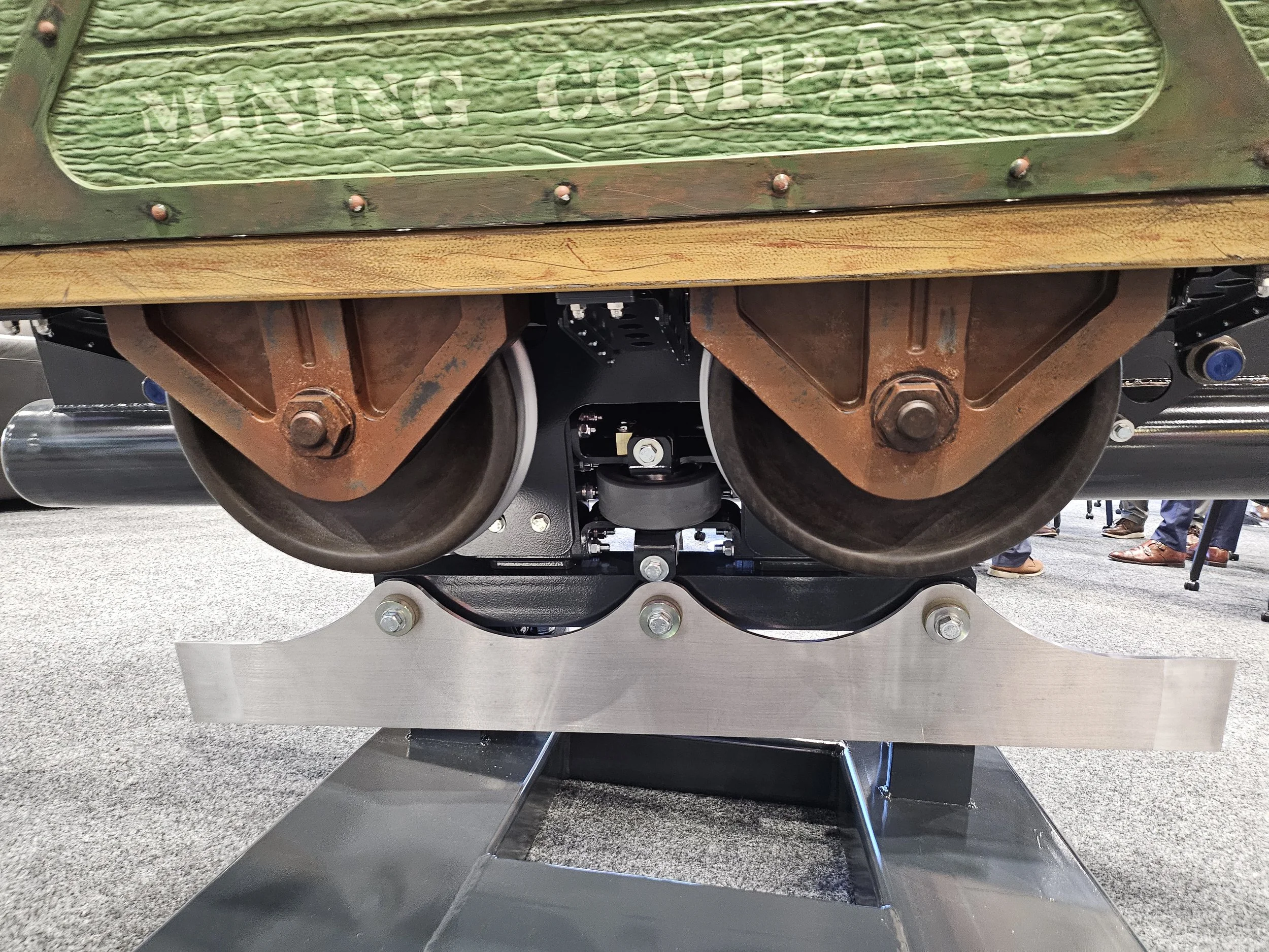 An image of the S&S RailRyder coaster with Mine Train theming at IAAPA 2025.