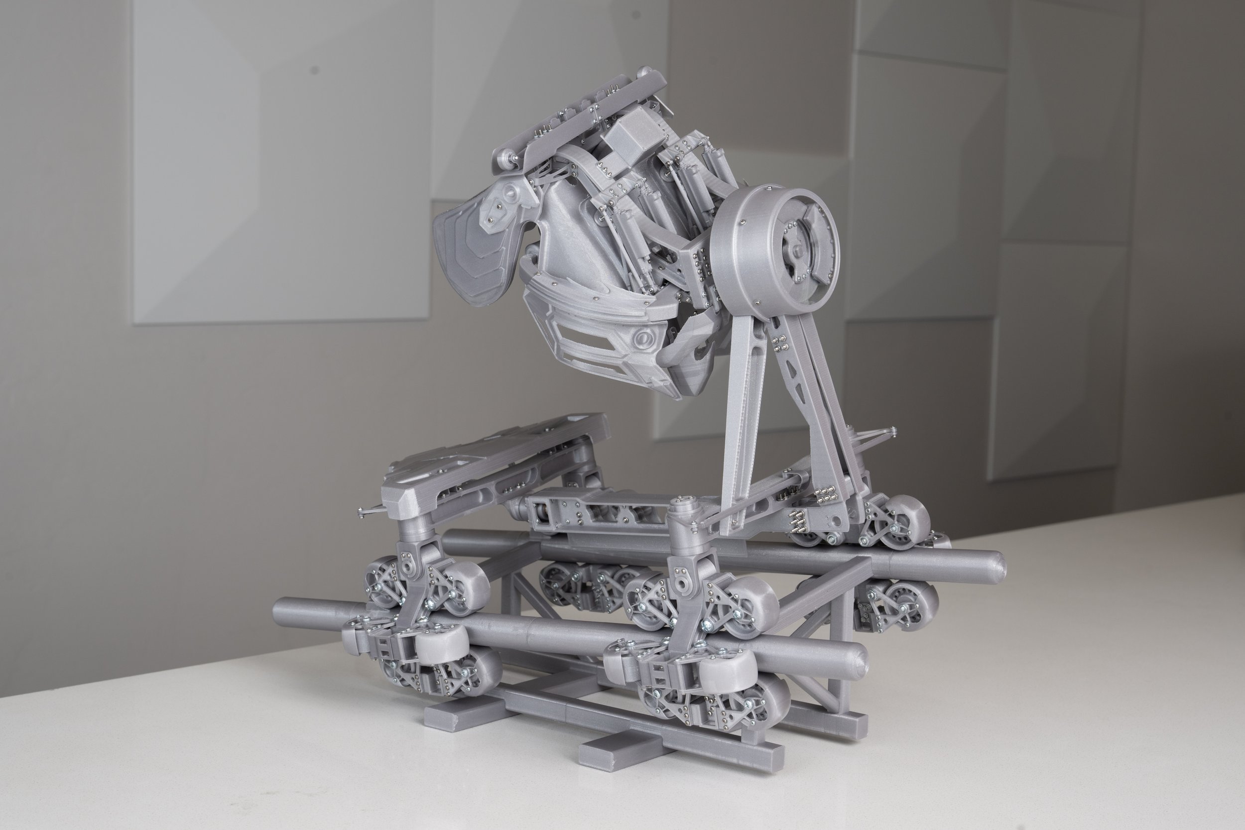 An image of a 3D printed model of the S&S AXIS coaster.