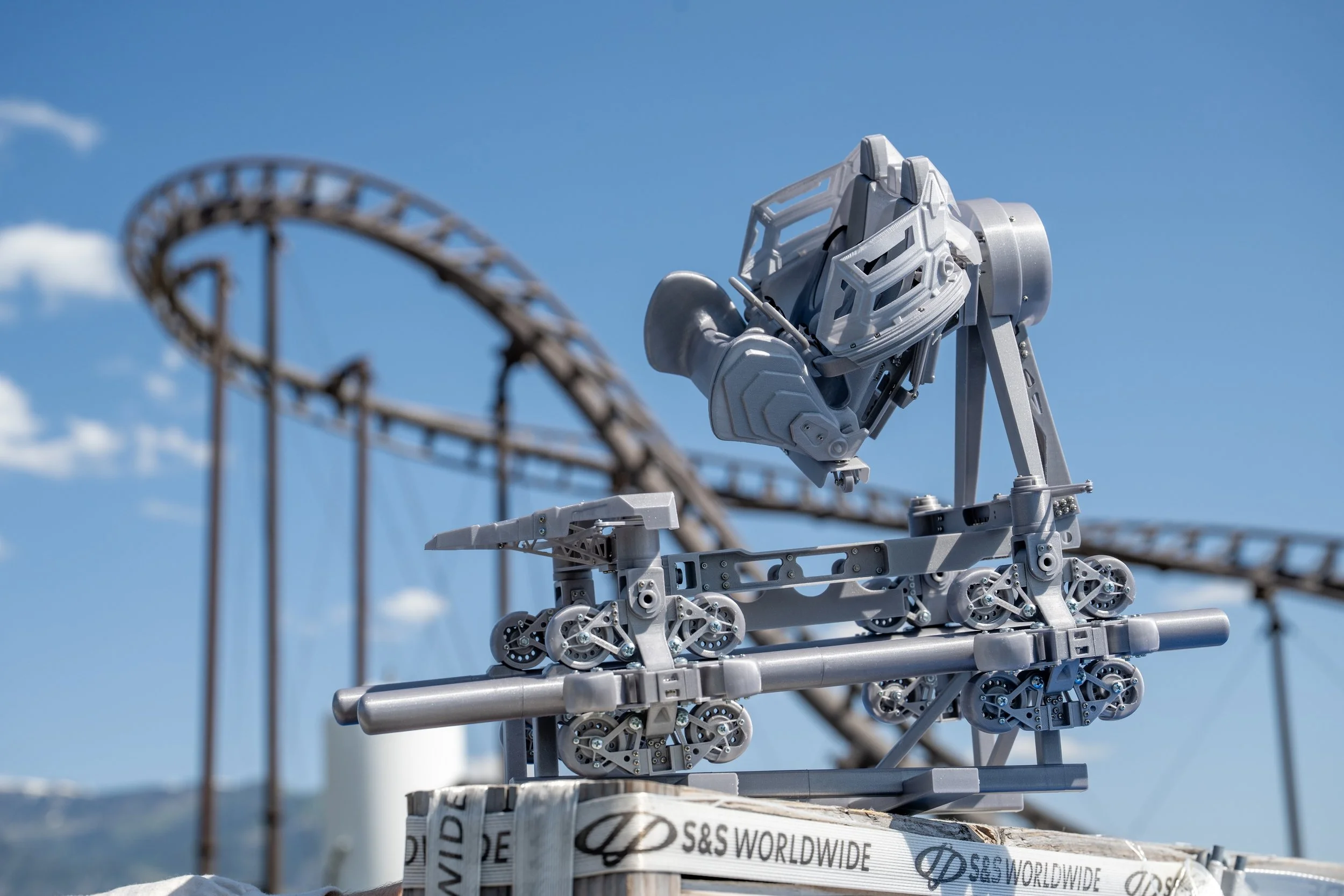 An image of a 3D printed model of the S&S AXIS coaster.